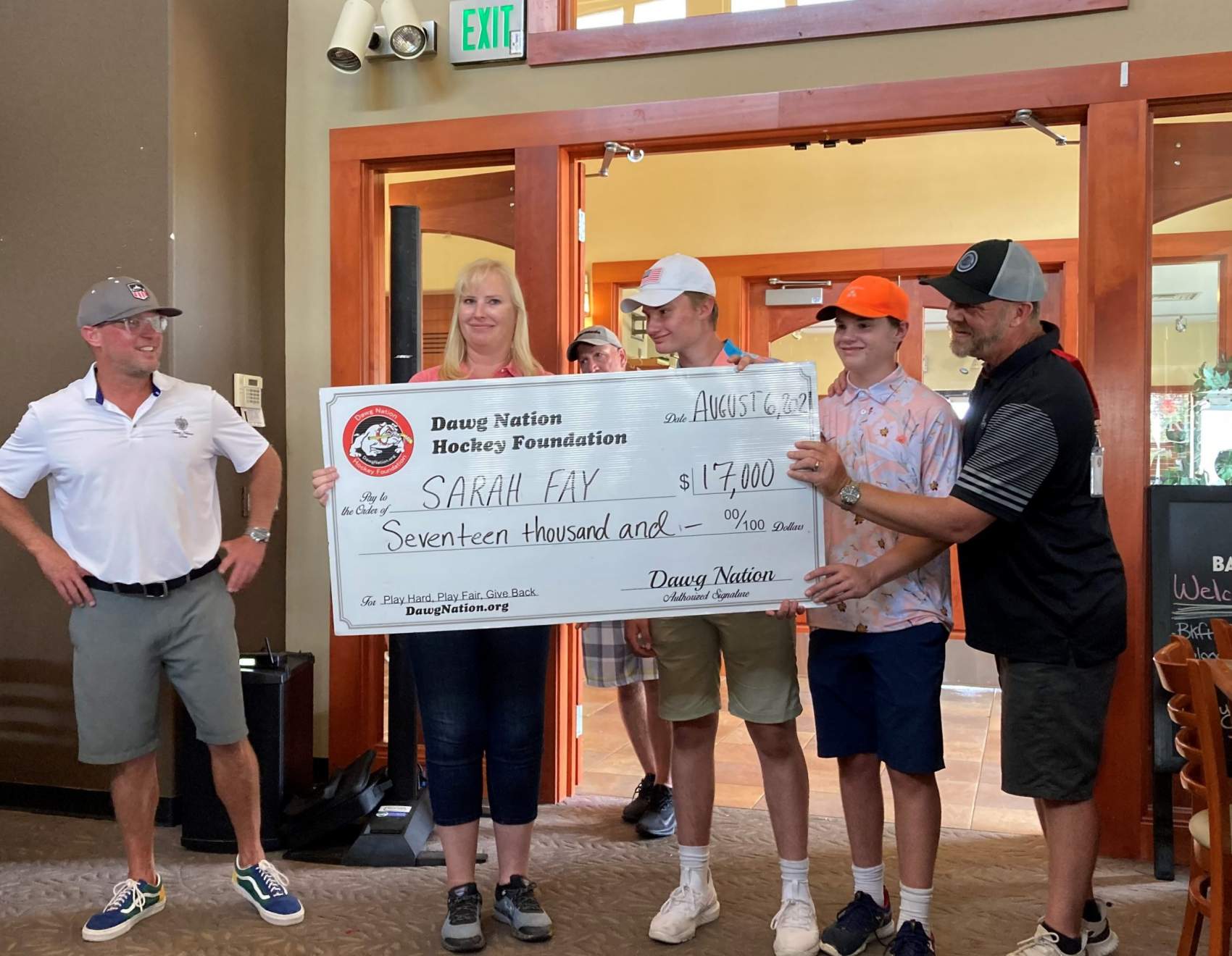 Presenting check to Sarah Fay