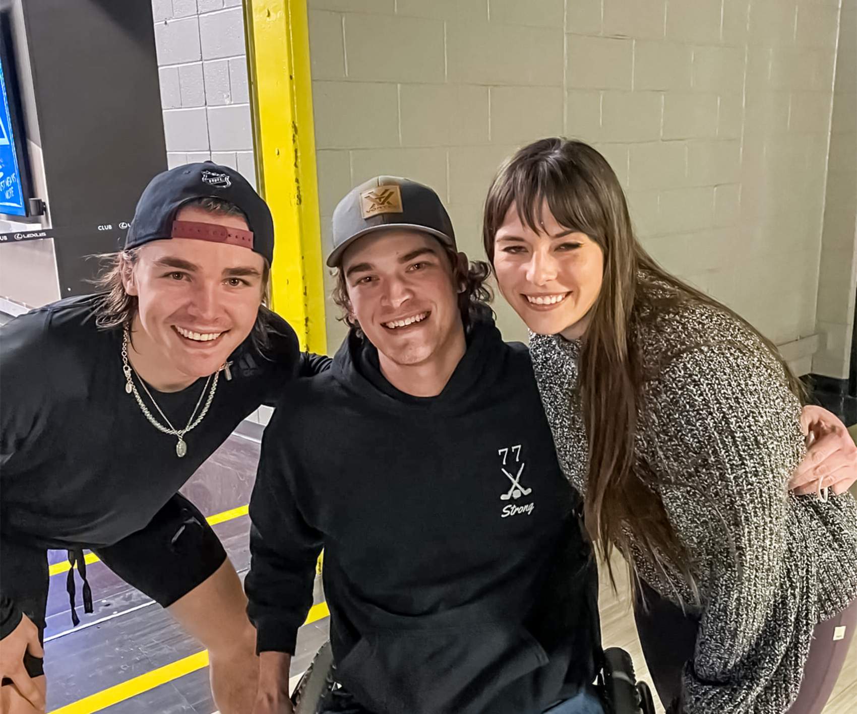 three young adults smiling