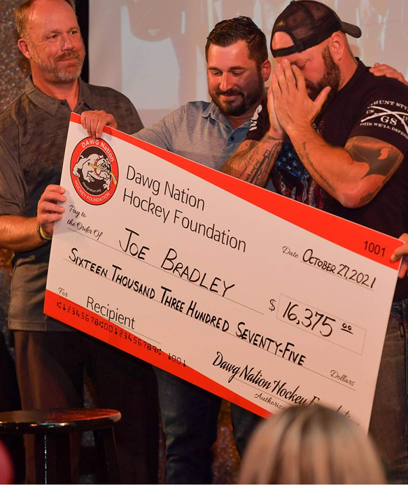 bradley receiving giant check