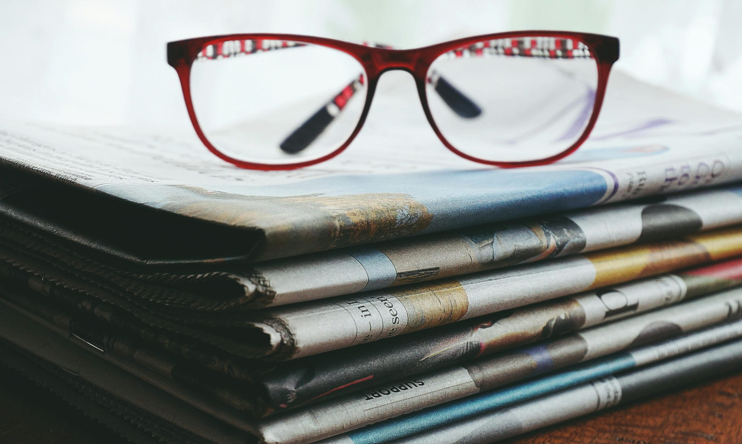 newspapers stacked