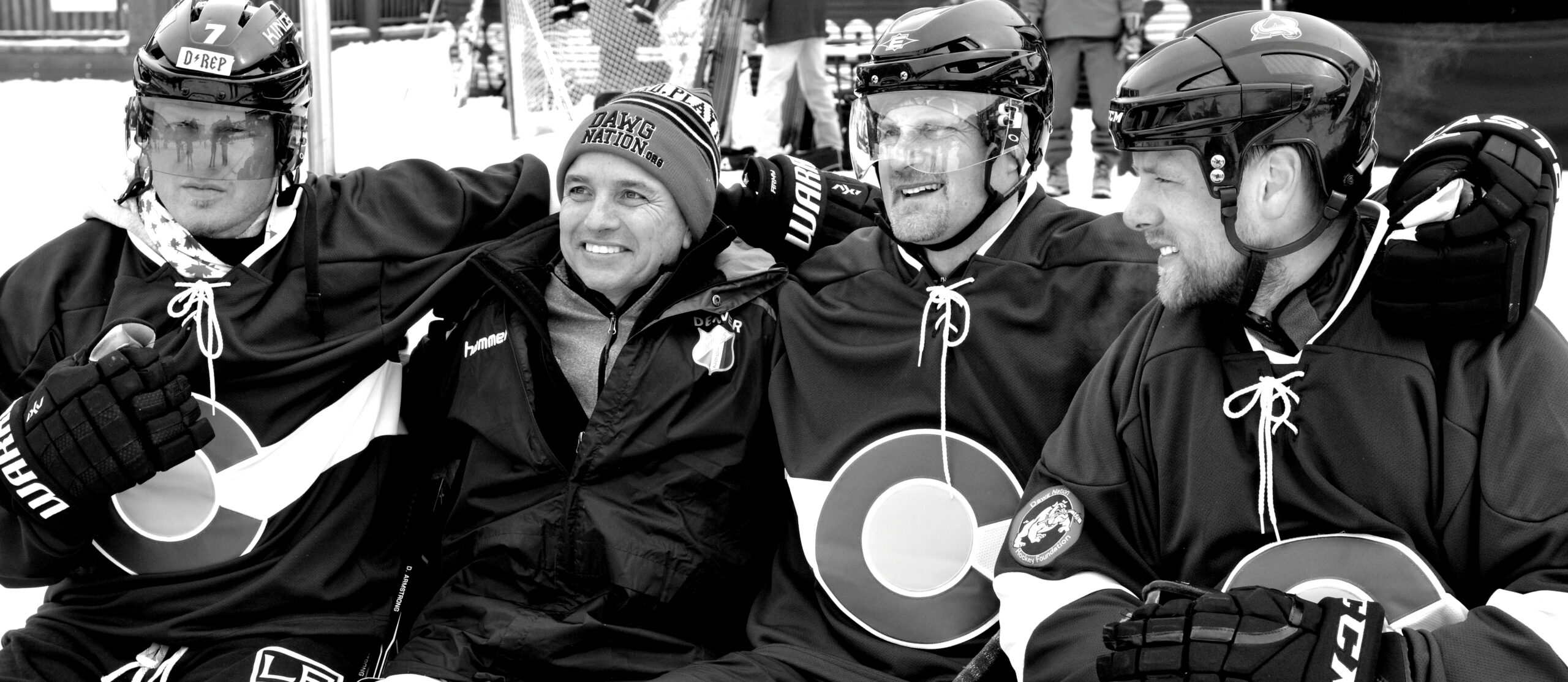 marty with celebrity hockey players at pond hockey