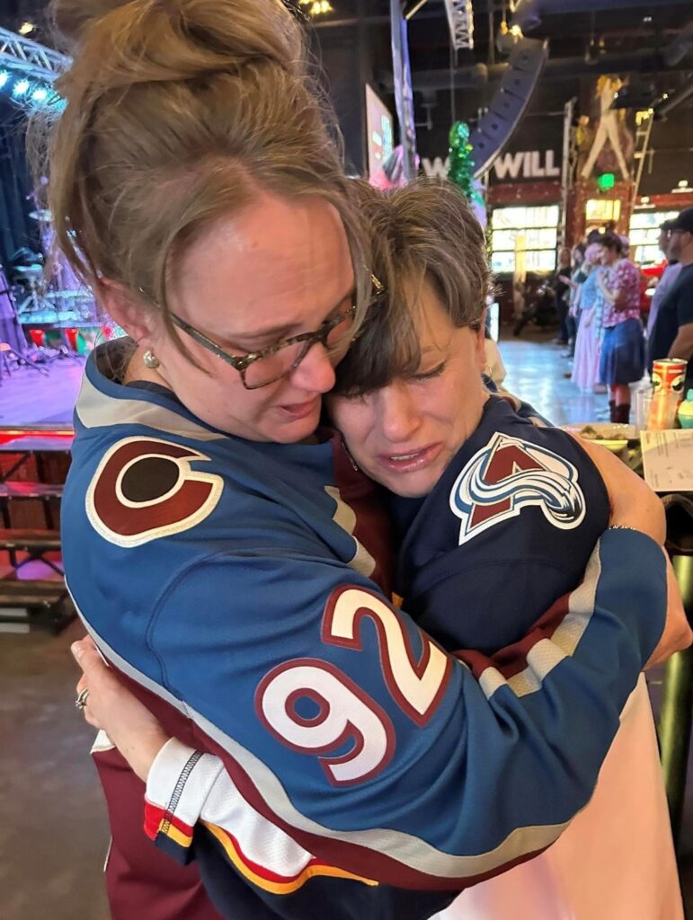 two women hugging