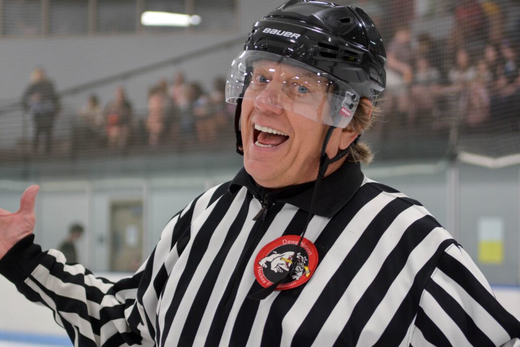 hockey referee smiling