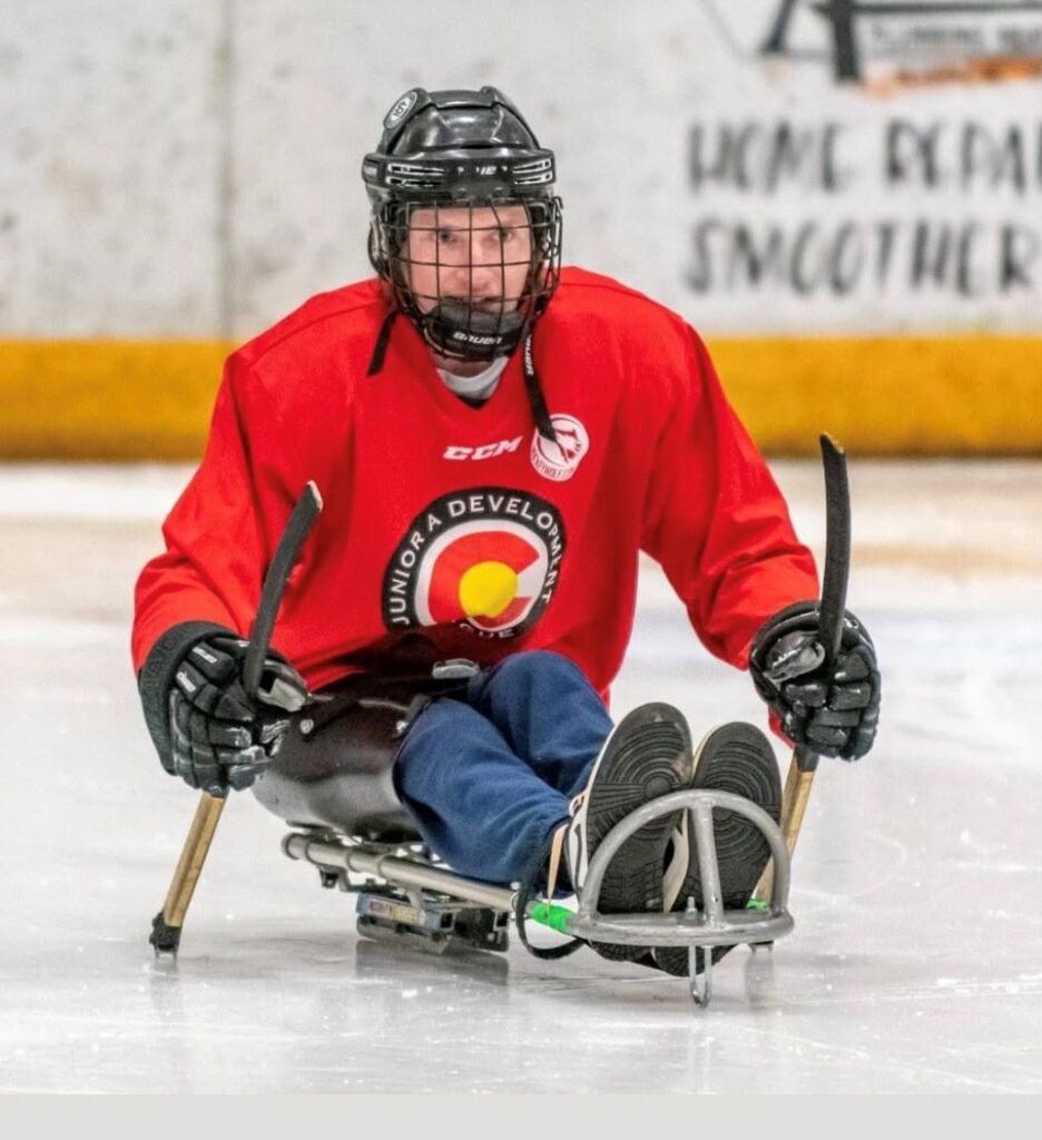 ashton in hockey sled